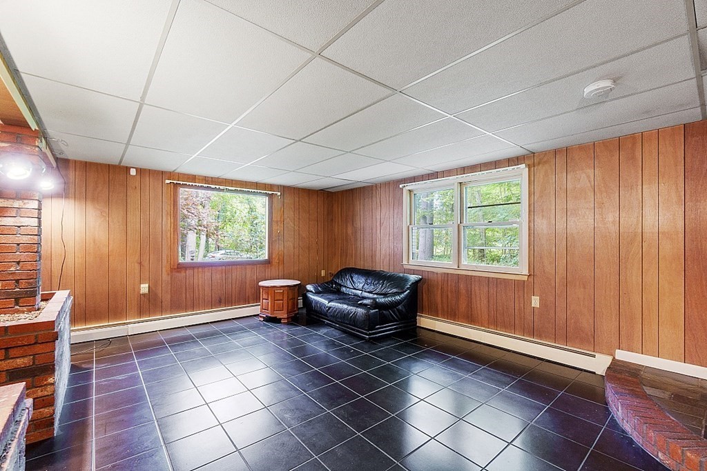 342 Taylor Road Stow, MA 01775 - Photo 8 of 42 a living room with furniture and a window