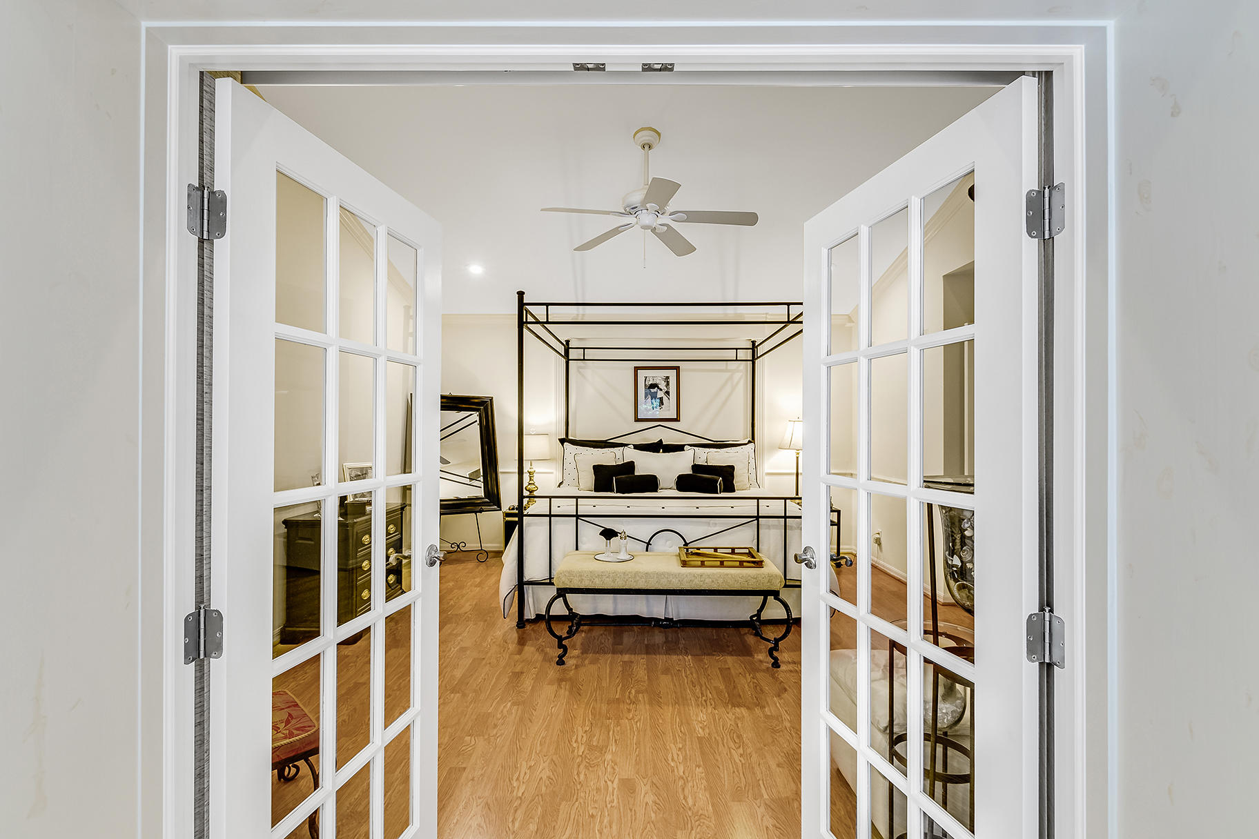 3870 Shearwater Drive Jupiter, FL 33477 - Photo 18 of 46 Master Bedroom French Door Entry