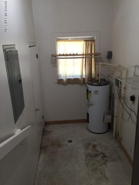 4773 Myrtlewood Road Jacksonville, FL 32210 - Photo 12 of 12 a room with a window
