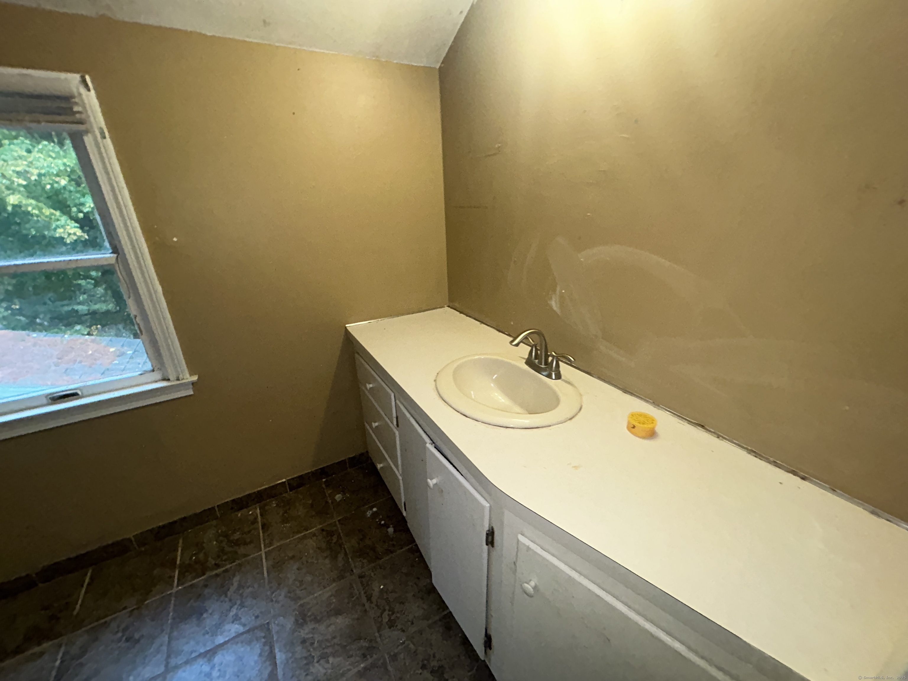 53 Falls Bashan Road East Haddam, CT 06469 - Photo 23 of 32 a bathroom with a sink and mirror