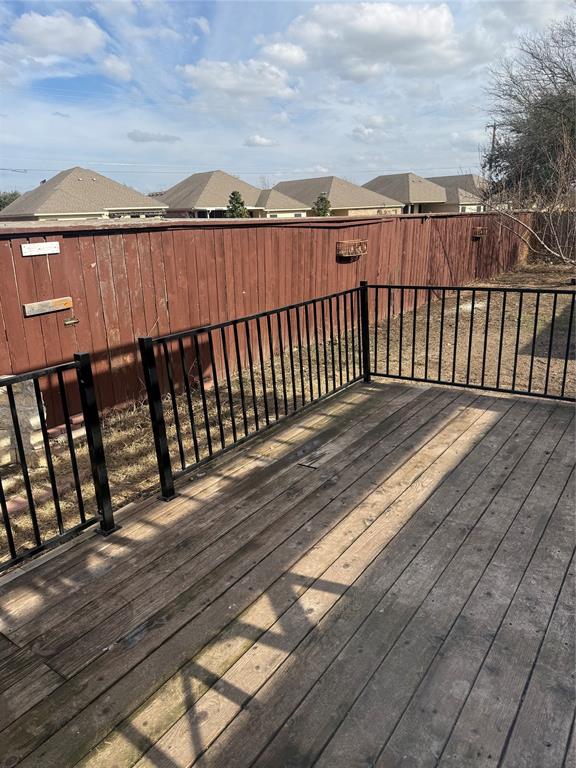 2524 Riders Way Woodway, TX 76712 - Photo 19 of 35 Wooden terrace with a residential view