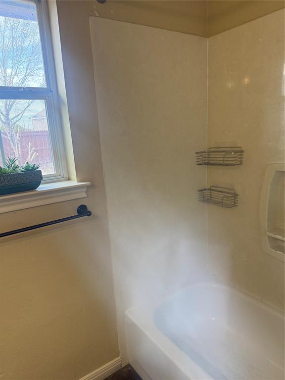 2524 Riders Way Woodway, TX 76712 - Photo 29 of 35 Full bathroom featuring baseboards and bathtub / shower combination