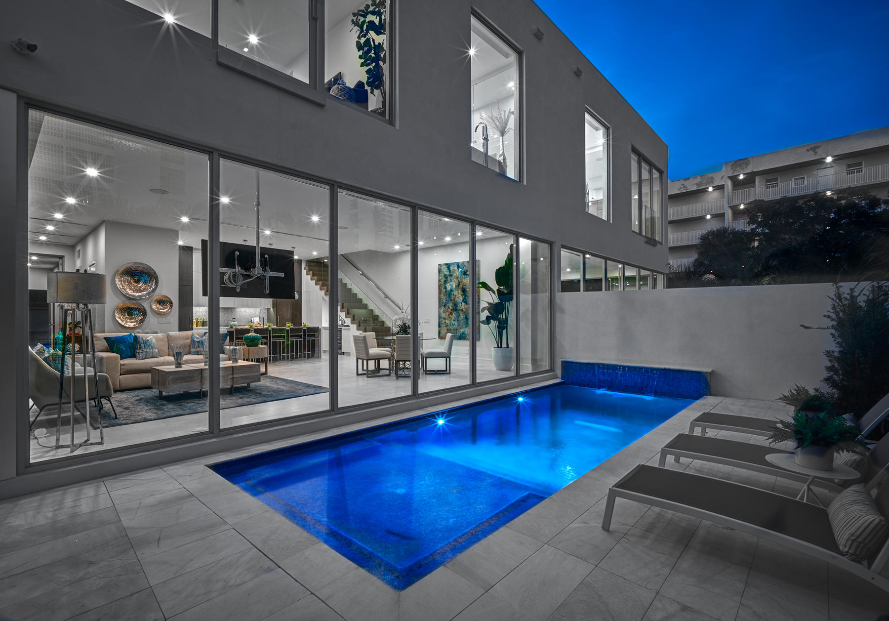 3092 Banyan Road, Unit A Boca Raton, FL 33432 - Photo 2 of 49 a living room with furniture a rug and a table