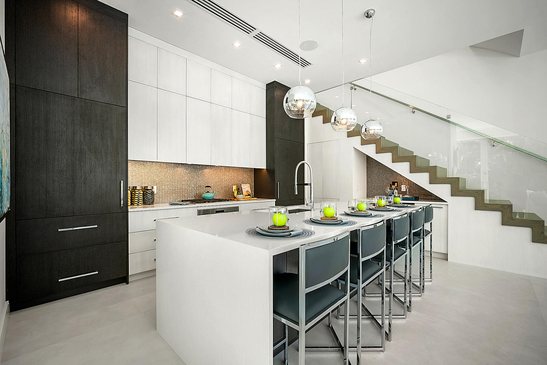 3092 Banyan Road, Unit A Boca Raton, FL 33432 - Photo 17 of 49 a kitchen with a stove a refrigerator and a dining table