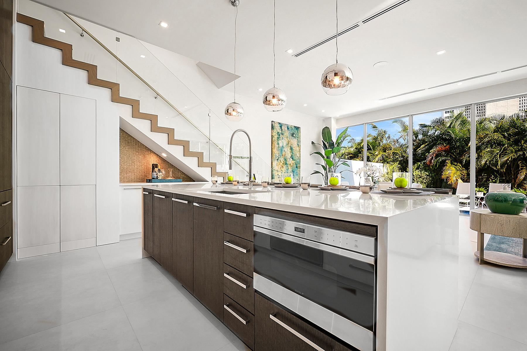 3092 Banyan Road, Unit A Boca Raton, FL 33432 - Photo 20 of 49 a kitchen with stainless steel appliances granite countertop a stove and a sink