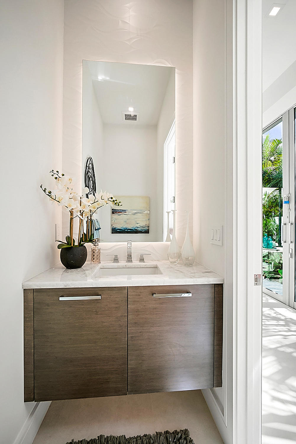 3092 Banyan Road, Unit A Boca Raton, FL 33432 - Photo 21 of 49 a bathroom with a sink vanity granite and a mirror