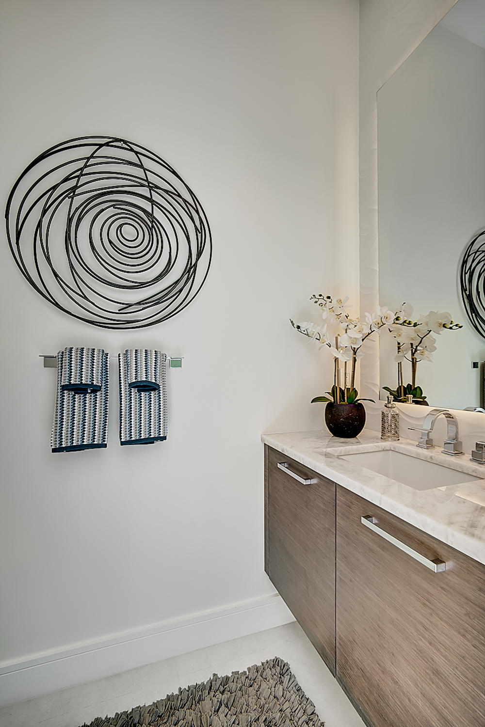 3092 Banyan Road, Unit A Boca Raton, FL 33432 - Photo 22 of 49 a bathroom with a sink and a mirror