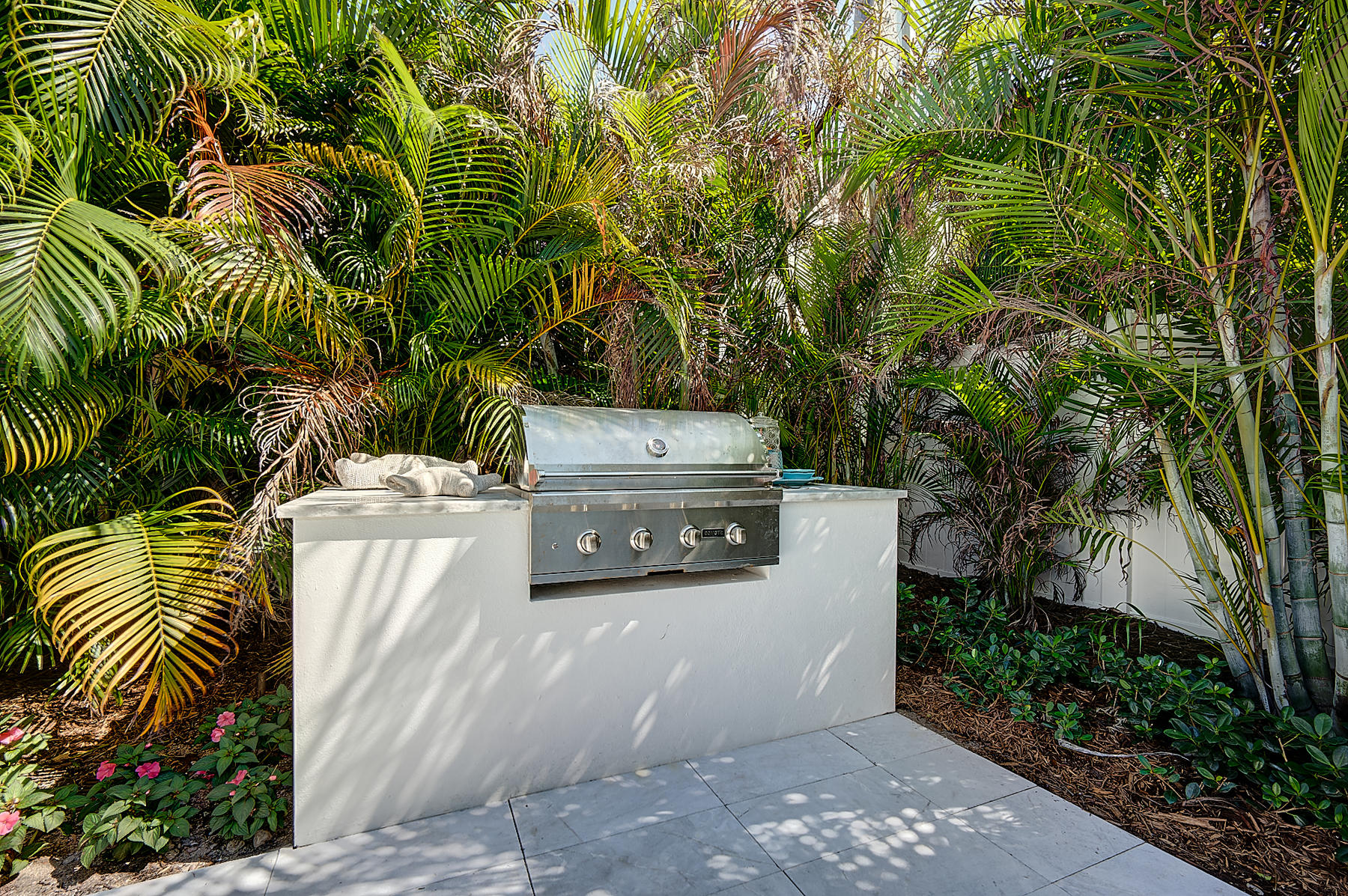 3092 Banyan Road, Unit A Boca Raton, FL 33432 - Photo 25 of 49 a view of a house with a yard