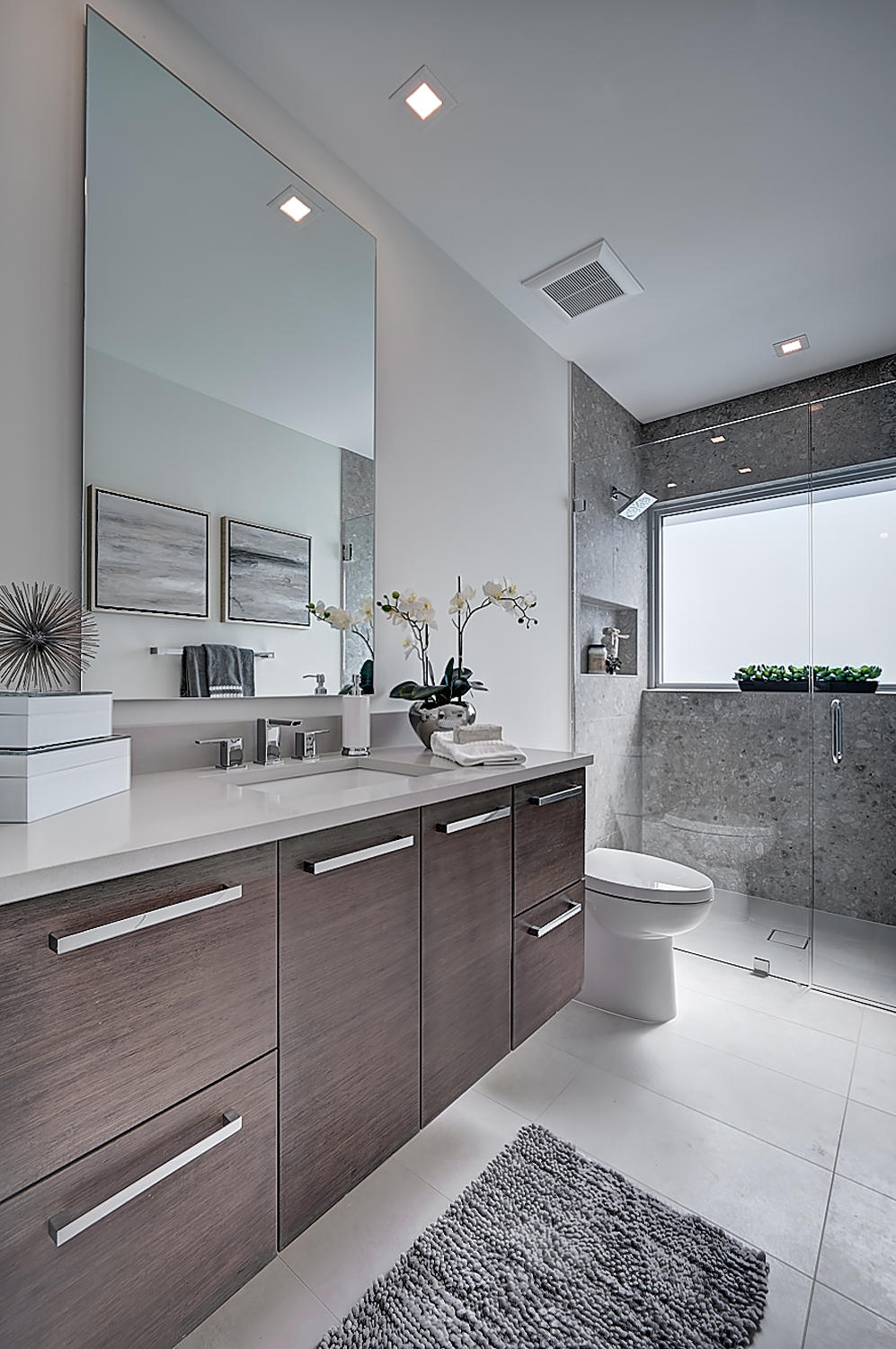 3092 Banyan Road, Unit A Boca Raton, FL 33432 - Photo 31 of 49 a room with a sink and a mirror