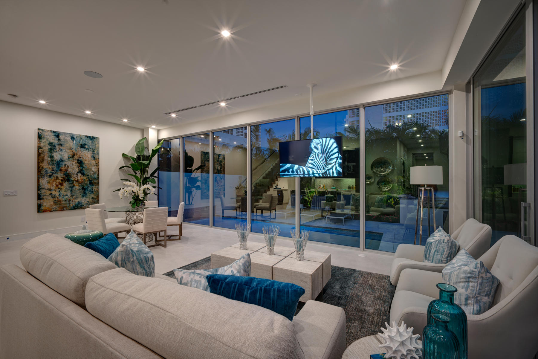 3092 Banyan Road, Unit A Boca Raton, FL 33432 - Photo 47 of 49 a living room with furniture and a glass door