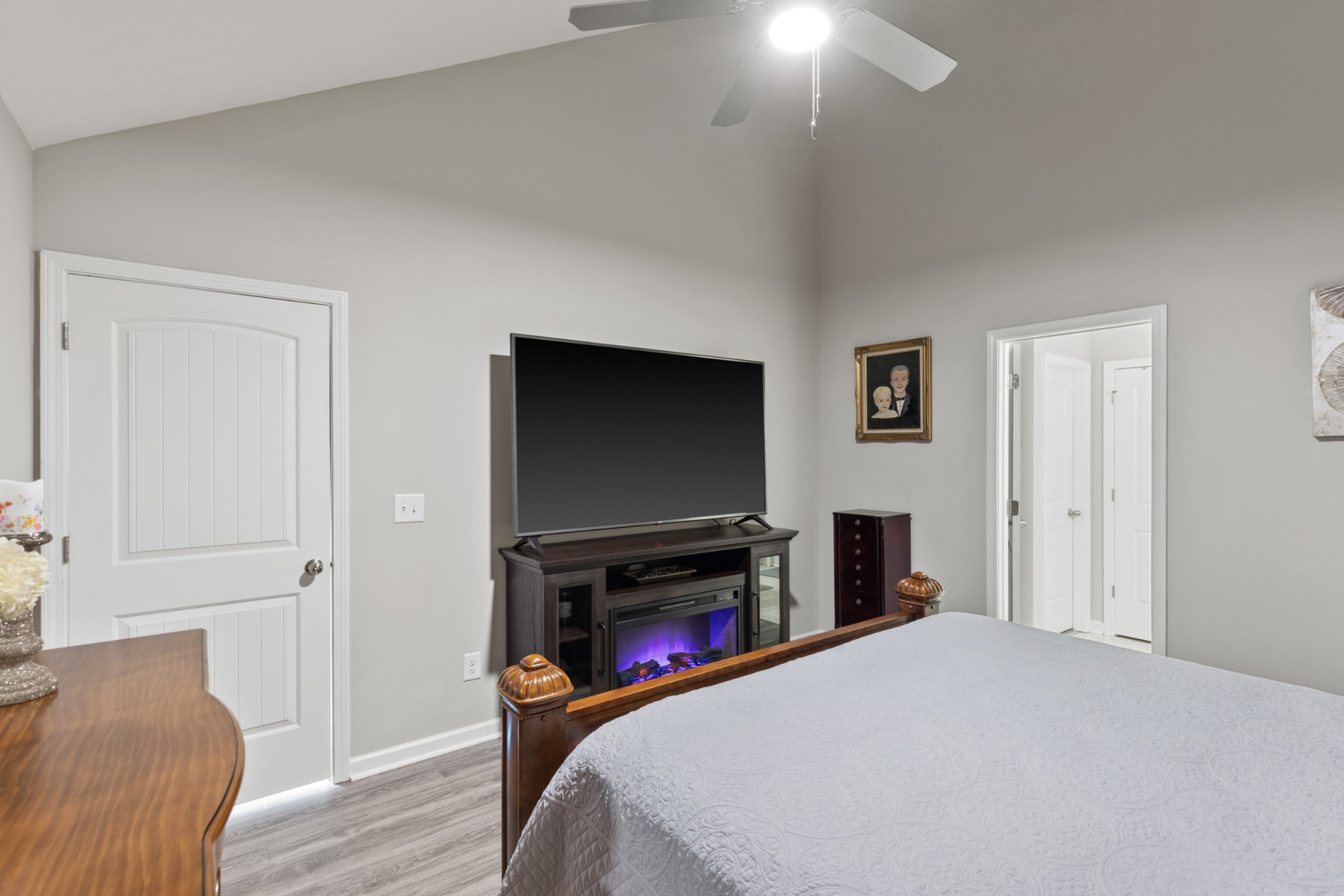 212 Addi Street Pleasant View, TN 37146 - Photo 18 of 37 a bedroom with a bed and a flat screen tv