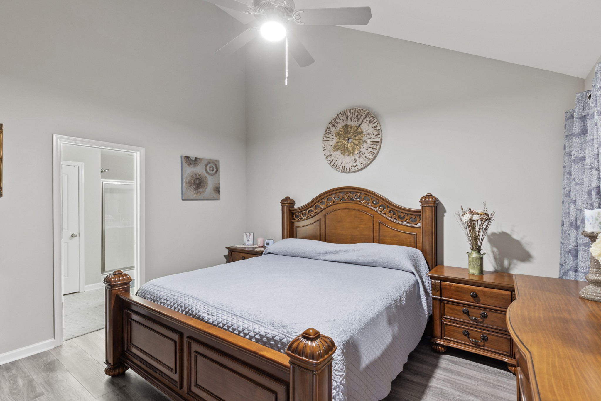 212 Addi Street Pleasant View, TN 37146 - Photo 19 of 37 a bedroom with a bed and a table in it