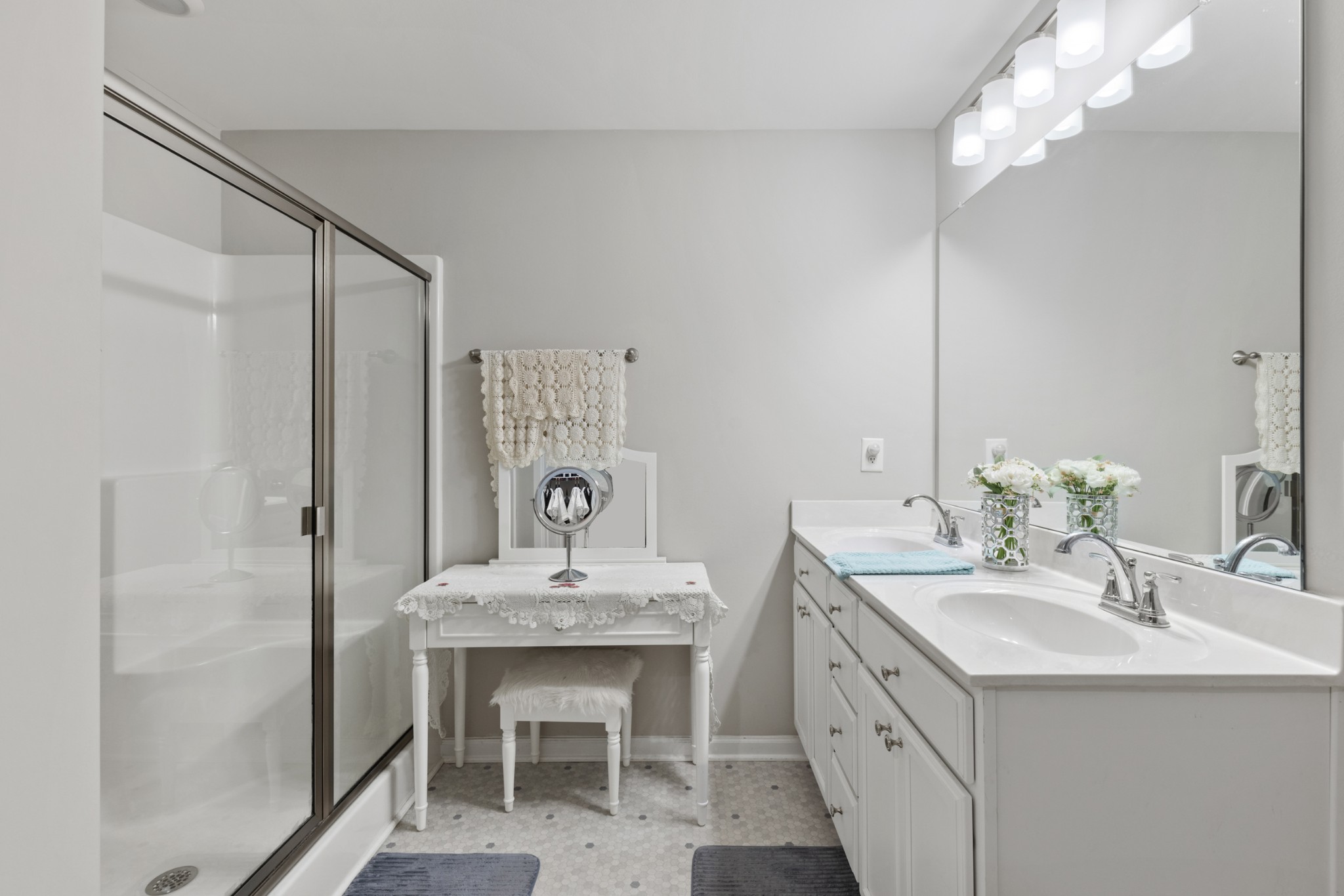 212 Addi Street Pleasant View, TN 37146 - Photo 21 of 37 a bathroom with a sink vanity and a mirror