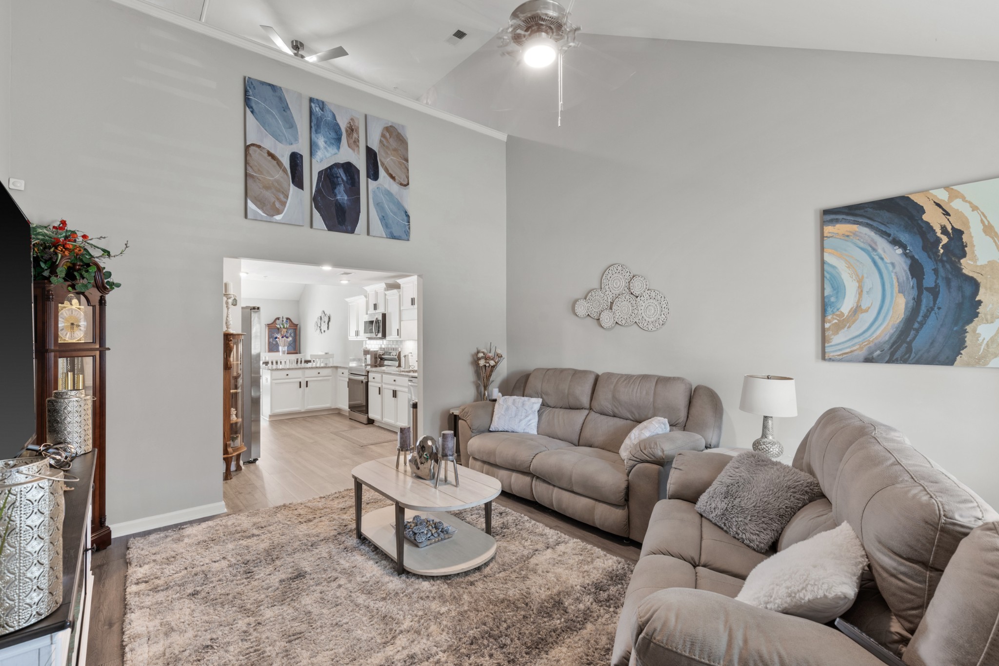 212 Addi Street Pleasant View, TN 37146 - Photo 4 of 37 a living room with furniture and a flat screen tv