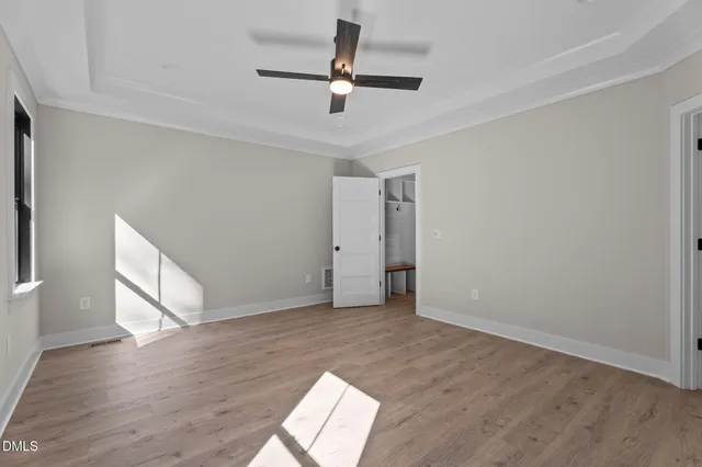 a bathroom with a double vanity sink mirror and shower