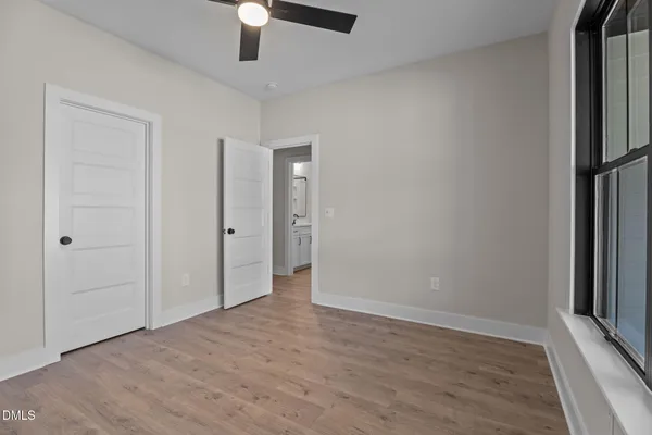 a view of a balcony with wooden floor