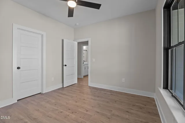 a view of a balcony with a floor to ceiling window