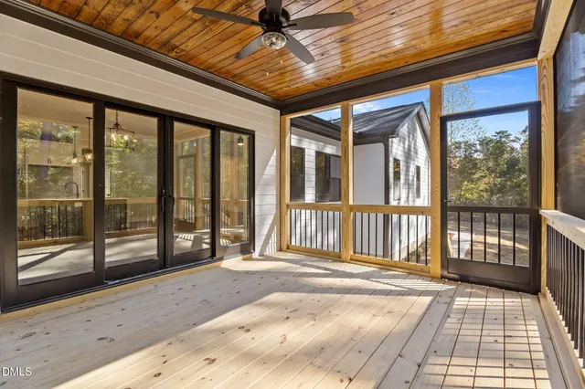 a front view of a house with wooden walls