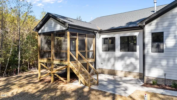 a front view of a house with wooden walls