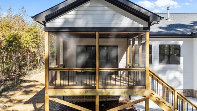 a front view of a house with a outdoor space