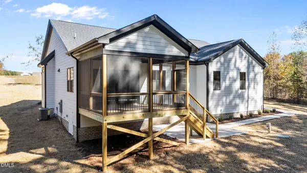 a front view of a house with a outdoor space