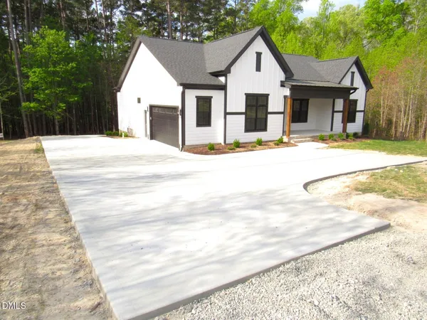 a view of a backyard of a house