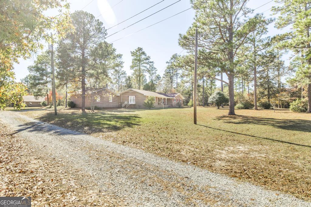 2574 Lower Hartley Bridge Road Byron, GA 31008 - Photo 2 of 45 a view of yard with tree