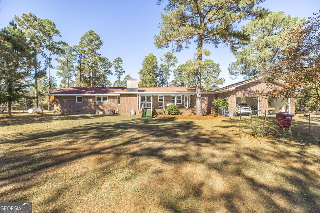 2574 Lower Hartley Bridge Road Byron, GA 31008 - Photo 28 of 45 a house view with a outdoor space