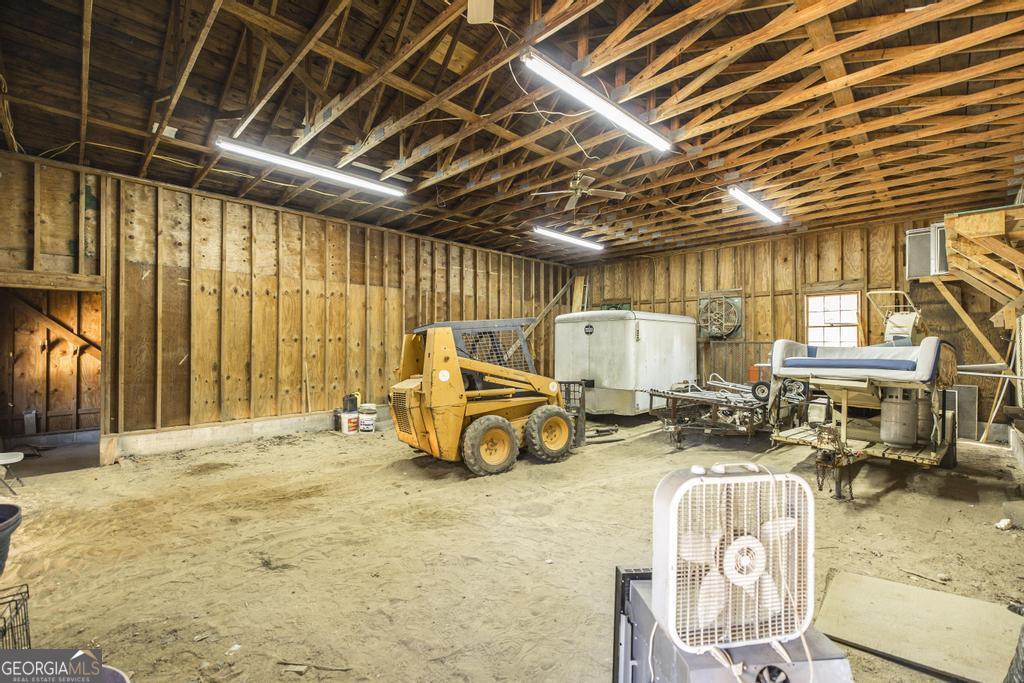2574 Lower Hartley Bridge Road Byron, GA 31008 - Photo 31 of 45 a view of a room with gym equipment