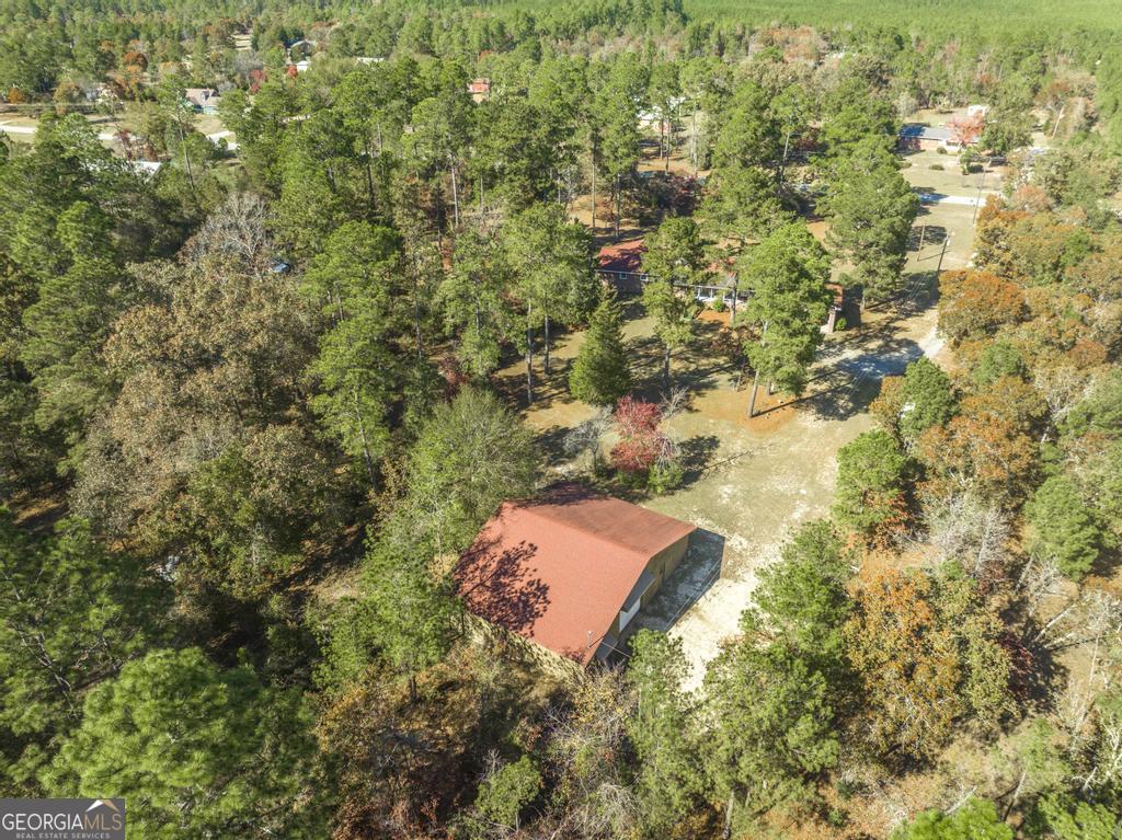 2574 Lower Hartley Bridge Road Byron, GA 31008 - Photo 41 of 45 an aerial view of a house with yard