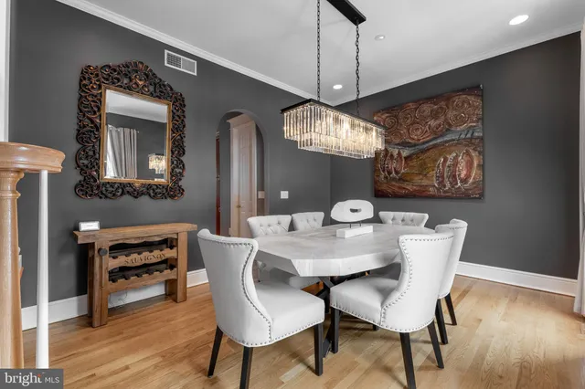 a kitchen with stainless steel appliances granite countertop a sink and a counter space