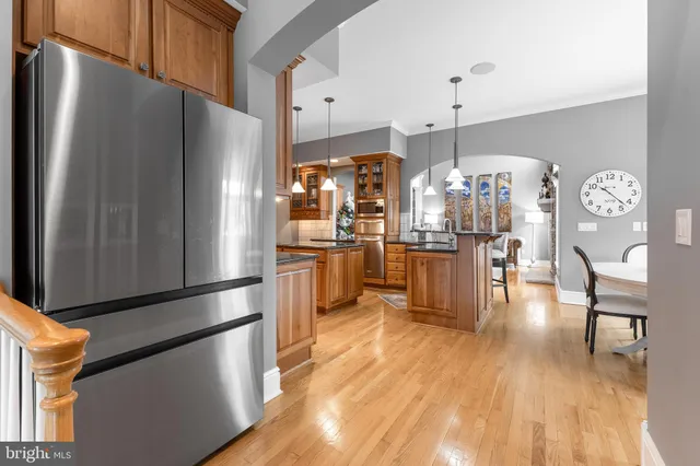 a living room with furniture potted plant and a fireplace