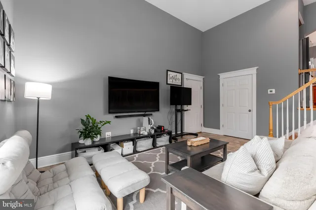 a stove top oven sitting inside of a kitchen