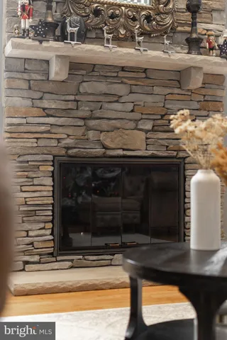 a bathroom with a toilet a sink and a mirror