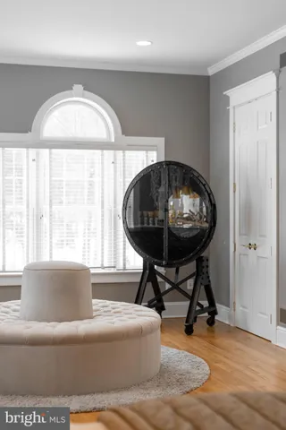 a spacious bedroom with a bed and a couch