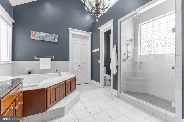 a kitchen that has a sink and a stove in it