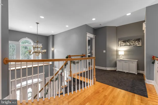 a living room with couch and a large window