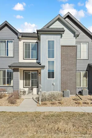 a front view of a house with a patio