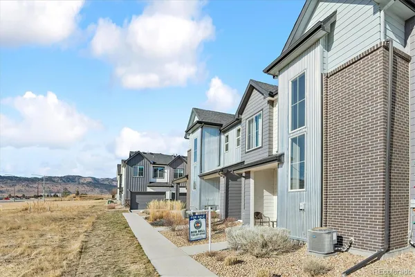 a front view of a house with lake view