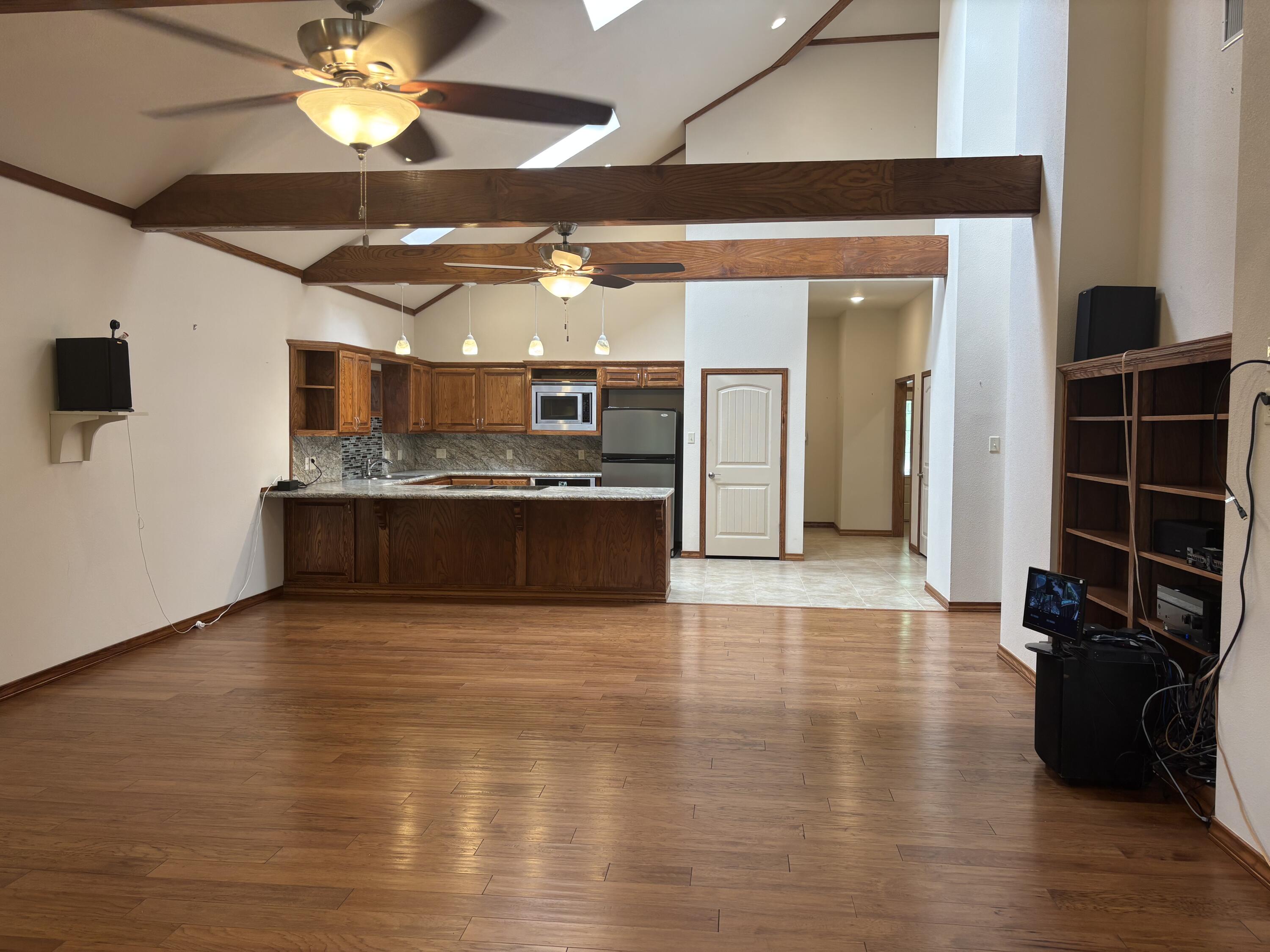33 West Lakeshore Drive Ransom Canyon, TX 79366 - Photo 12 of 48 a view of kitchen with refrigerator and window