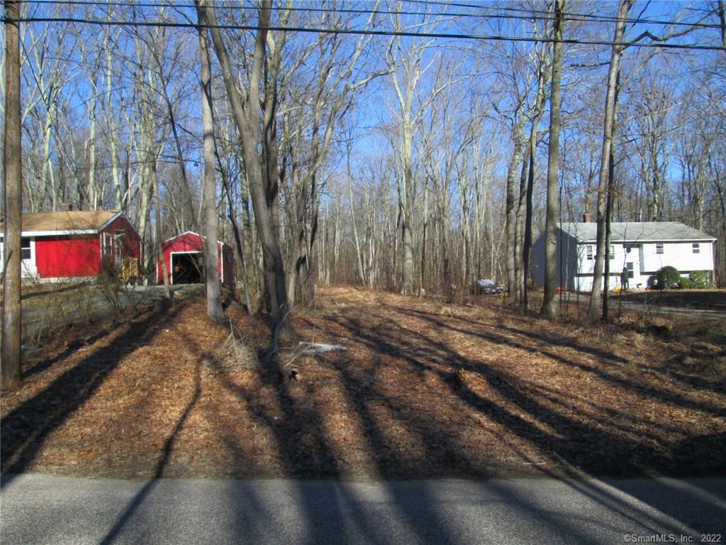 0 Woods Road Mansfield Center, CT 06250 - Photo 1 of 1 View of 50' frontage that goes between two houses.