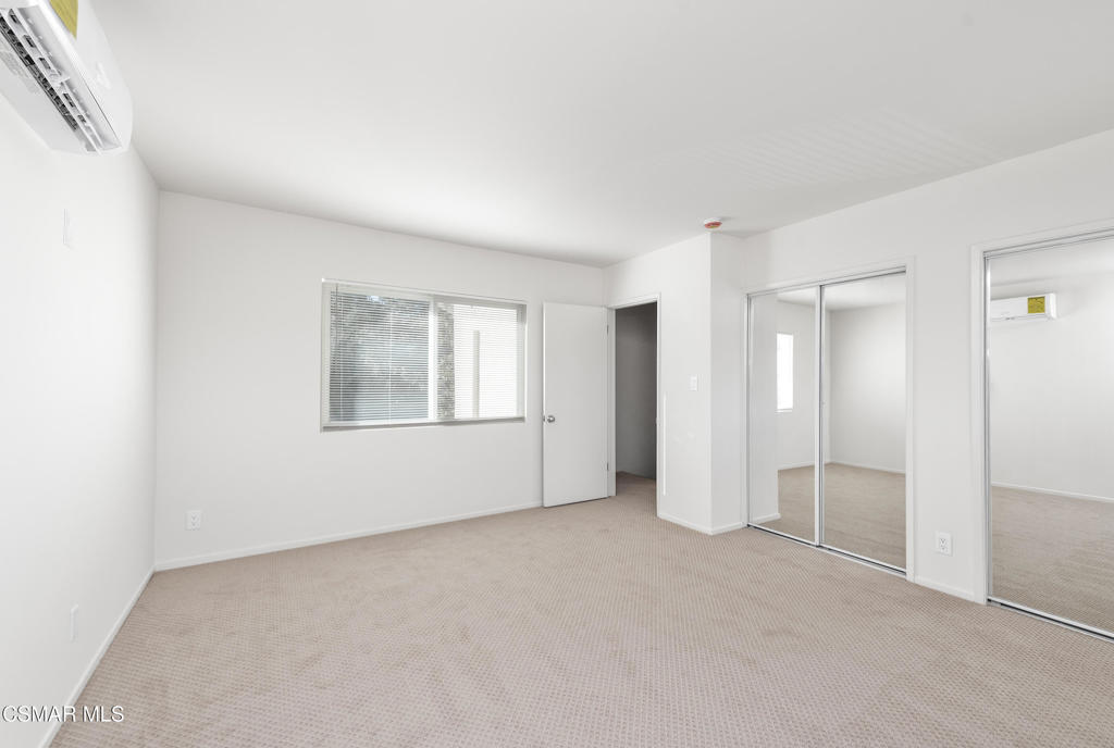 22002 Ybarra Road Woodland Hills, CA 91364 - Photo 15 of 31 a view of an empty room with a window