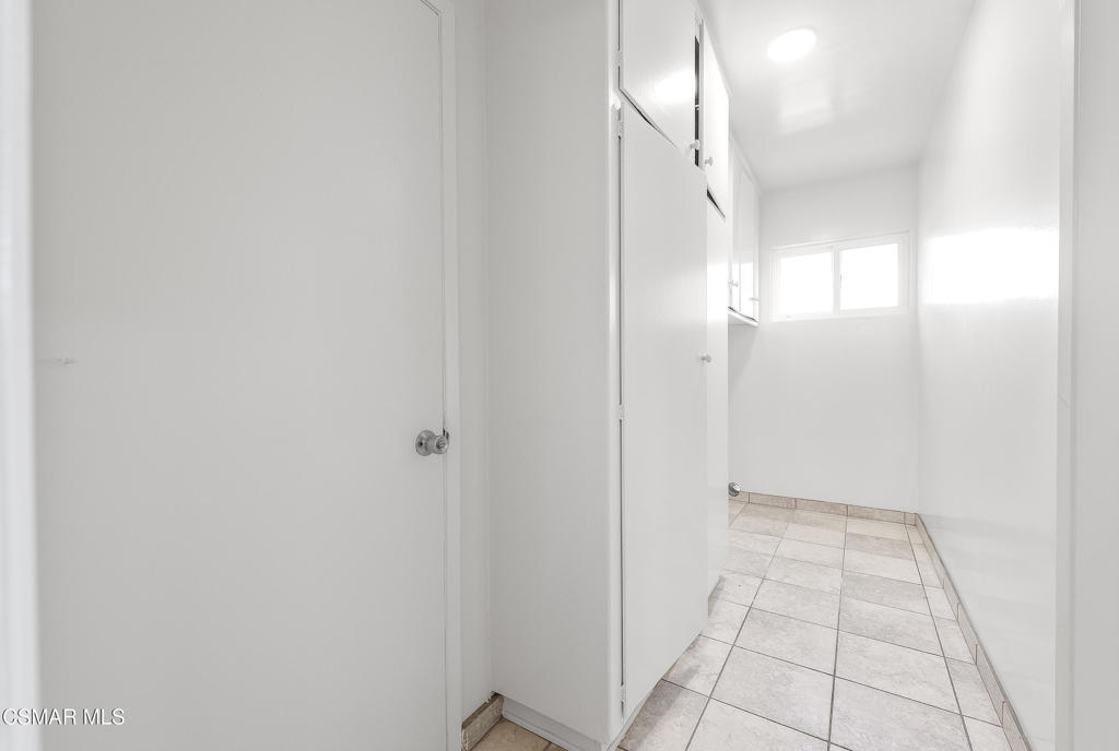 22002 Ybarra Road Woodland Hills, CA 91364 - Photo 23 of 31 a view of an empty room