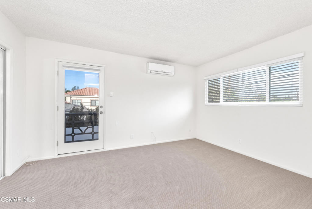 22002 Ybarra Road Woodland Hills, CA 91364 - Photo 25 of 31 a view of an empty room with a window