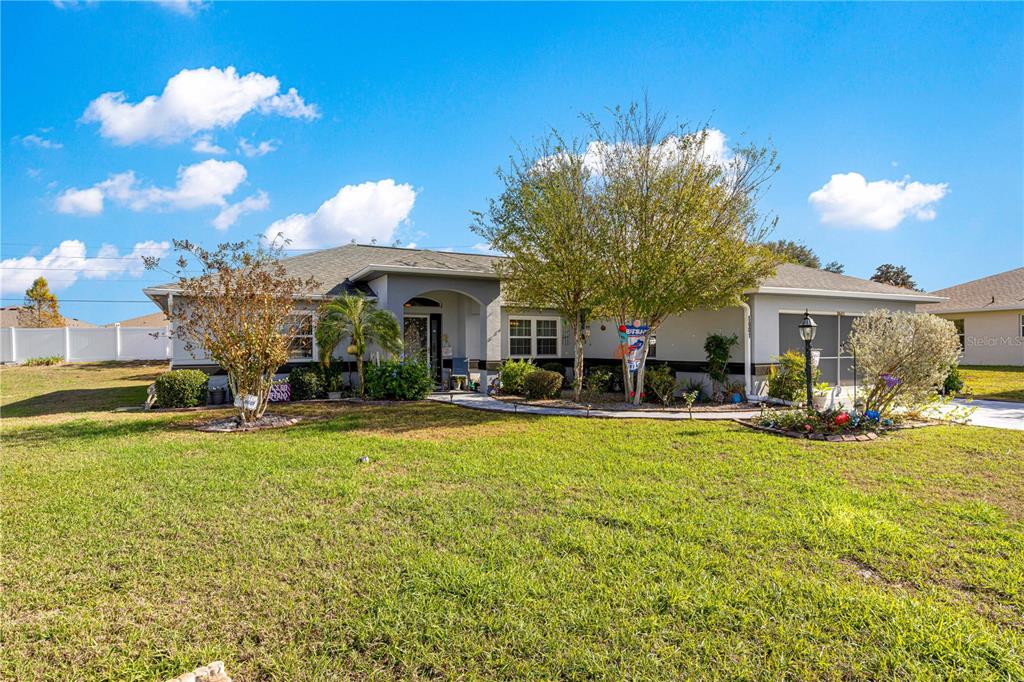 8601 Southwest 60th Circle Ocala, FL 34476 - Photo 1 of 45 a view of a house with swimming pool and sitting area