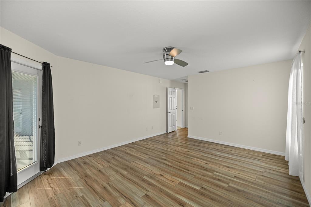 8601 Southwest 60th Circle Ocala, FL 34476 - Photo 17 of 37 a view of empty room with wooden floor