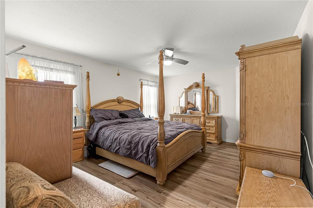 8601 Southwest 60th Circle Ocala, FL 34476 - Photo 17 of 45 a living room with a bed furniture and a window