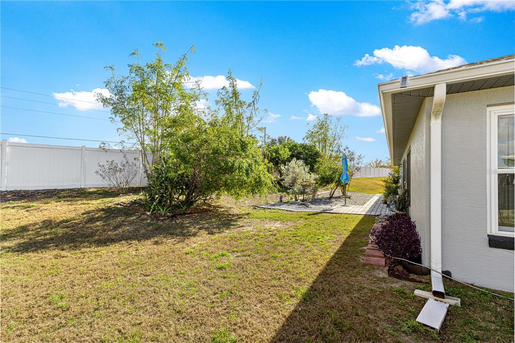 8601 Southwest 60th Circle Ocala, FL 34476 - Photo 23 of 37 a view of a house with a backyard