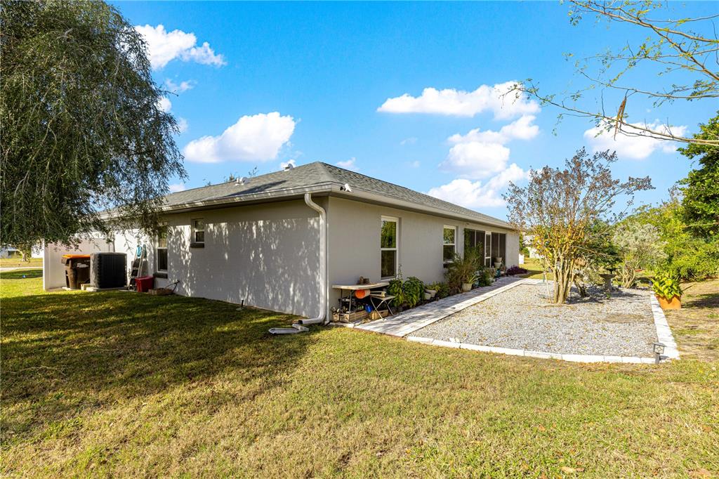 8601 Southwest 60th Circle Ocala, FL 34476 - Photo 26 of 37 a view of a house with backyard