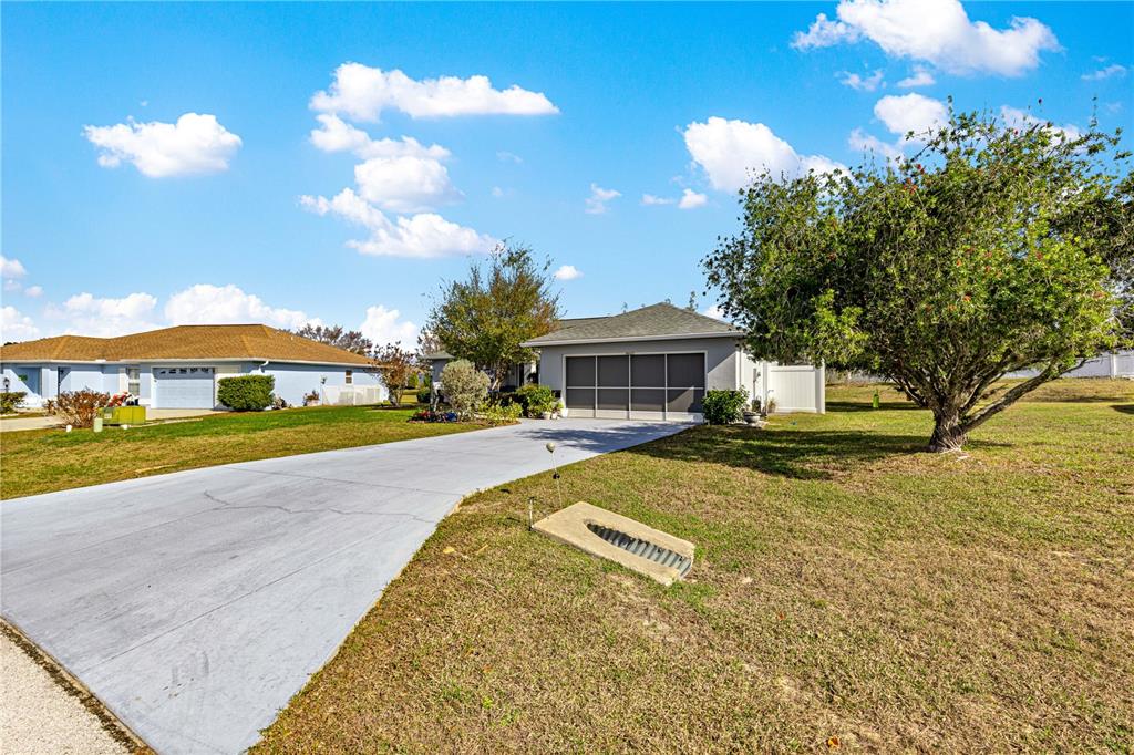 8601 Southwest 60th Circle Ocala, FL 34476 - Photo 28 of 37 a view of a house with swimming pool and sitting area